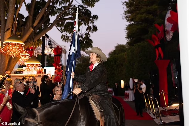 Guests were treated to a horse show with riders carrying the Australian and company flags